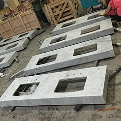 Carrara marble vanity top with mitered apron